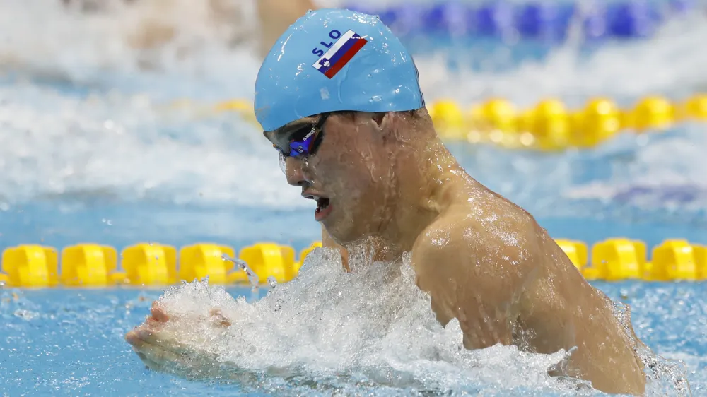 Slovenia's Peter John Stevens competes in a men's 50-meter breaststroke semifinal during the European Swimming Championships at the London Aquatics Centre in London, Friday, May 20, 2016. (AP Photo/Matt Dunham)