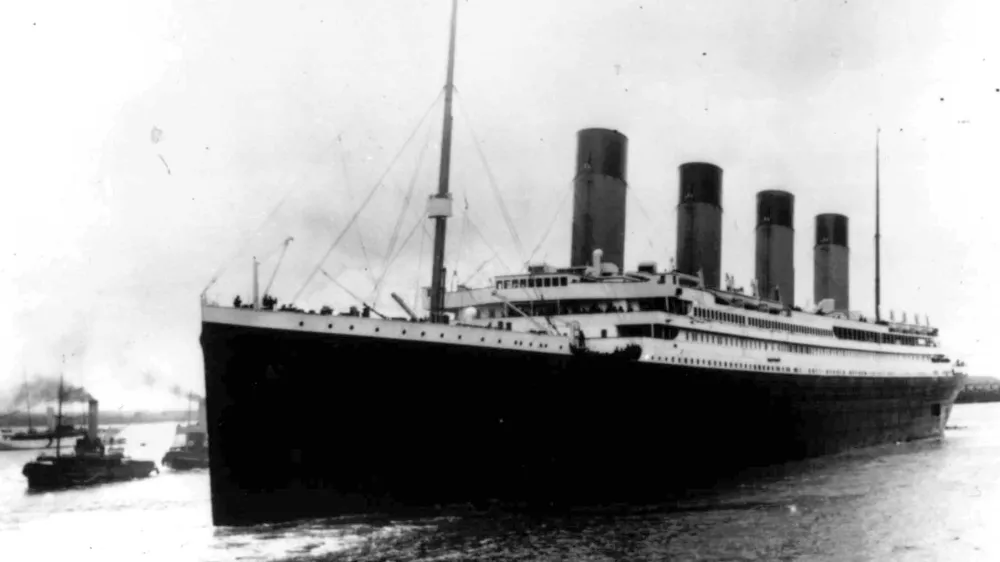 In this April 10, 1912, file photo, the liner Titanic leaves Southampton, England on her maiden voyage. Nearly 100 years after the Titanic went down, a cruise with the same number of passengers aboard is setting sail to retrace the ship's voyage, including a visit to the location where it sank. The Titanic Memorial Cruise is set to depart Sunday, April 8, 2012, from Southampton, where the Titanic left on its maiden voyage. (AP Photo/File)