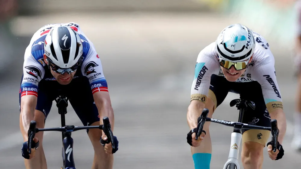 Cycling - Tour de France - Stage 19 - Moirans-En-Montagne to Poligny - France - July 21, 2023 Team Bahrain Victorious' Matej Mohoric crosses the finish line to win stage 19 alongside second placed Soudal&ndash;Quick-Step's Kasper Asgreen REUTERS/Stephane Mahe   TPX IMAGES OF THE DAY