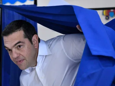 07 July 2019, Greece, Athens: Greek Prime Minister and leader of the Syriza party Alexis Tsipras casts his ballot at a polling station during the parliamentary elections. Photo: Eurokinissi/Eurokinissi/dpa