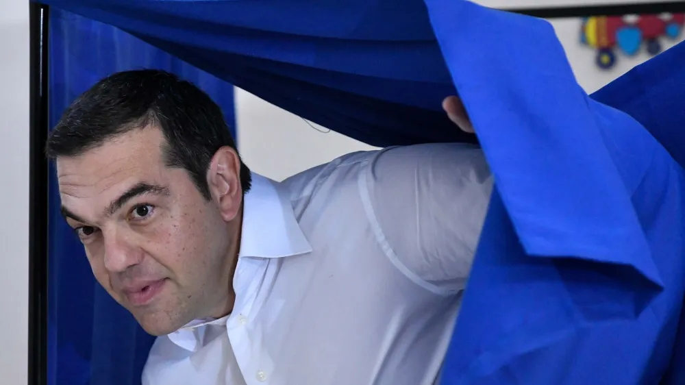 07 July 2019, Greece, Athens: Greek Prime Minister and leader of the Syriza party Alexis Tsipras casts his ballot at a polling station during the parliamentary elections. Photo: Eurokinissi/Eurokinissi/dpa