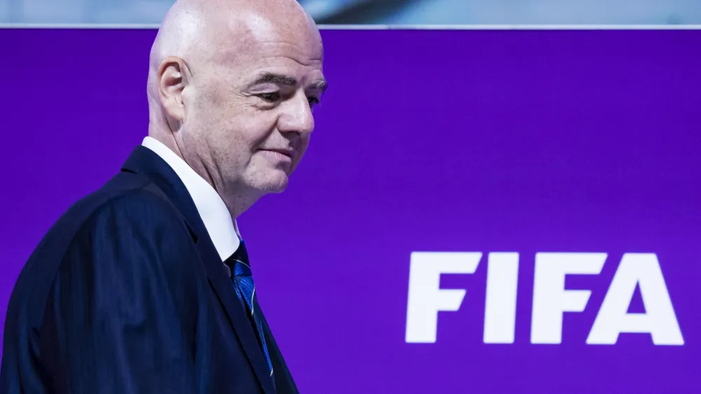 FILED - 16 December 2022, Qatar, Doha: FIFA President Gianni Infantino speaks at a press conference. Infantino was on Thursday re-elected unopposed as president of football's ruling body FIFA for a four-year term until 2027. Photo: Tom Weller/dpa