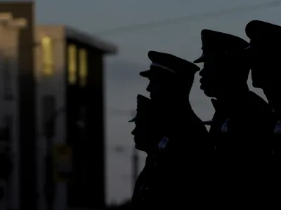 San Francisco Firefighters listen as the names of the firefighters and emergency responders who lost their lives on Sept. 11, 2001, are read at a fire station in San Francisco, Monday, Sept. 11, 2023. Americans are looking back on the horror and legacy of 9/11, gathering Monday, Sept. 11, 2023, at memorials, firehouses, city halls and elsewhere to observe the 22nd anniversary of the deadliest terror attack on U.S. soil.&nbsp;(AP Photo/Jeff Chiu)