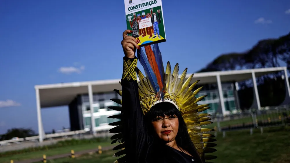Indigenous Congresswoman Celia Xakriaba poses for a photo after a majority in Brazil's Supreme Court voted against the constitutionality of laws to limit the ability of Indigenous people to win protected status for ancestral lands, in Brasilia, Brazil September 21, 2023. REUTERS/Ueslei Marcelino   TPX IMAGES OF THE DAY