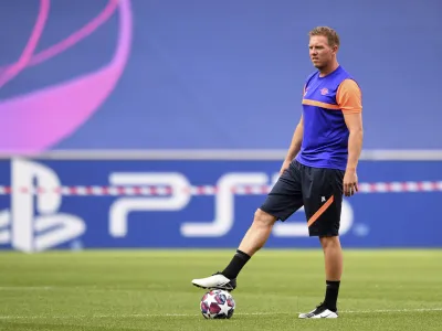 Leipzig's head coach Julian Nagelsmann directs a training session at the Luz stadium in Lisbon, Monday Aug. 17, 2020. Leipzig will play PSG in a Champions League semifinals soccer match on Tuesday. (David Ramos/Pool via AP)