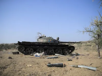 FILE PHOTO: Ammunition is seen next to a tank destroyed in a fight between the Ethiopian National Defence Force (ENDF) and the Tigray People's Liberation Front (TPLF) forces in Kasagita town, Afar region, Ethiopia, February 25, 2022. Picture taken February 25, 2022.REUTERS/Tiksa Negeri/File Photo