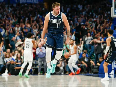 Oct 27, 2023; Dallas, Texas, USA; Dallas Mavericks guard Luka Doncic (77) reacts after hitting a go ahead 3-pointer late in the fourth quarter against the Brooklyn Nets at American Airlines Center. Mandatory Credit: Andrew Dieb-USA TODAY Sports