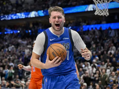 Dec 2, 2023; Dallas, Texas, USA; Dallas Mavericks guard Luka Doncic (77) reacts to being called for a traveling violation during the second half against the Oklahoma City Thunder at the American Airlines Center. Mandatory Credit: Jerome Miron-USA TODAY Sports