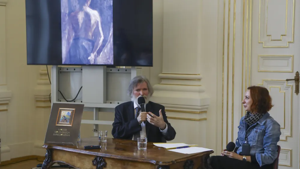 avtor knjige umetnostni zgodovinar dr. Milček Komelj- 06.12.2023 - Narodna galerija - predstavitev bibliofilske monografije prof. dr. Milčka Komelja: Mojstri slovenskega impresionizma, ki je iz&scaron;la pri Cankarjevi založbi. //FOTO: Luka Cjuha