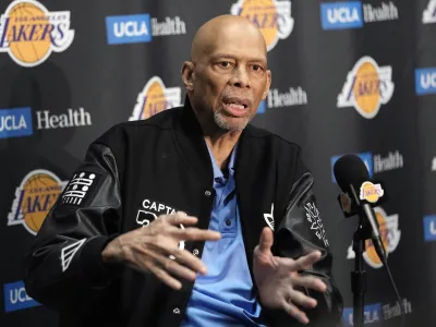 Kareem Abdul-Jabbar speaks during a news conference prior to an NBA basketball game between the Los Angeles Lakers and the Milwaukee Bucks Thursday, Feb. 9, 2023, in Los Angeles. Kareem Abdul-Jabbar fell at a concert in Los Angeles and broke his hip. The NBA Hall of Famer was attending a show Friday night Dec. 15, 2023 when he was injured. Paramedics at the undisclosed venue responded and the 76-year-old was transported to a hospital for treatment. (AP Photo/Mark J. Terrill)