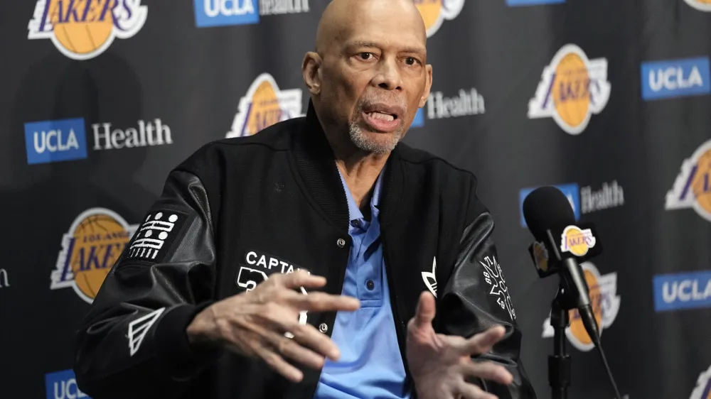 Kareem Abdul-Jabbar speaks during a news conference prior to an NBA basketball game between the Los Angeles Lakers and the Milwaukee Bucks Thursday, Feb. 9, 2023, in Los Angeles. Kareem Abdul-Jabbar fell at a concert in Los Angeles and broke his hip. The NBA Hall of Famer was attending a show Friday night Dec. 15, 2023 when he was injured. Paramedics at the undisclosed venue responded and the 76-year-old was transported to a hospital for treatment. (AP Photo/Mark J. Terrill)