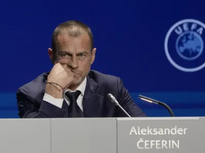 FILE - President of UEFA Aleksander Ceferin listens to questions during a news conference, after being reelected, at the end of the 47th ordinary UEFA congress in Lisbon, Wednesday, April 5, 2023. The European Union's top court has ruled UEFA and FIFA acted contrary to competition law by blocking plans for the breakaway Super League. The&nbsp;case was heard&nbsp;last year at the Court of Justice after Super League failed at launch in April 2021. UEFA President Aleksander Ceferin called the club leaders "snakes" and "liars." (AP Photo/Armando Franca, File)