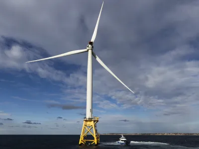A Block Island Wind Farm turbine operates, Thursday, Dec. 7, 2023, off the coast of Block Island, R.I., during a tour organized by Orsted. (AP Photo/Julia Nikhinson)