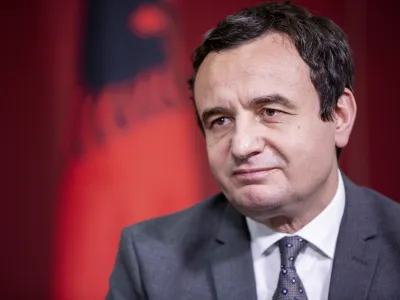 FILE - In this Sunday, Feb. 14, 2021 file photo, Albin Kurti leader of Vetevendosje (Self-Determination) speaks during an interview with The Associated Press in capital Pristina, Kosovo. Kosovo&acirc;&euro;&trade;s newly-elected parliament has approved the new government challenged by the management of the virus pandemic following recent surging numbers. In an extraordinary session after the first one held earlier Monday, March 22, 2021 the parliament voted 67 in favor and 30 against the new Cabinet presented by Prime Minister Albin Kurti. (AP Photo/ Visar Kryeziu, file)