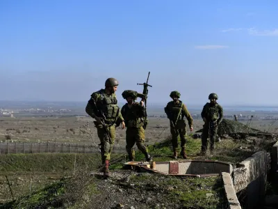 Israeli soldiers operate in the Israeli-occupied Golan Heights near the border with Syria, amid the ongoing conflict between Israel and the Palestinian Islamist group Hamas, December 28, 2023. REUTERS/Gil Eliyahu ISRAEL OUT. NO COMMERCIAL OR EDITORIAL SALES IN ISRAEL   TPX IMAGES OF THE DAY