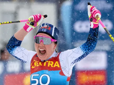 Kerttu Niskanen of Finland, the winner, reacts in the finish area after the women's 10 km classic race at the FIS Tour de Ski in Lenzerheide, Switzerland, Wednesday, Dec. 29, 2021. (Peter Schneider/Keystone via AP)