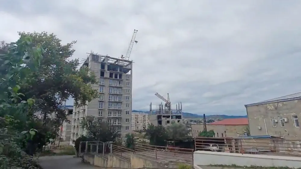 A general view of Stepanakert, called Khankendi by Azerbaijan, in the Nagorno-Karabakh region as gunfire and explosions are heard there, September 19, 2023, in this screengrab obtained from a handout video. Artsakh Public TV/Handout via REUTERS  THIS IMAGE HAS BEEN SUPPLIED BY A THIRD PARTY. NO RESALES. NO ARCHIVES. ARMENIA OUT. NO COMMERCIAL OR EDITORIAL SALES IN ARMENIA. AZERBAIJAN OUT. NO COMMERCIAL OR EDITORIAL SALES IN AZERBAIJAN