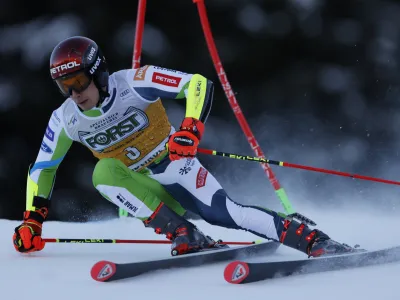 Slovenia's Zan Kranjec speeds down the course during an alpine ski, men's World Cup giant slalom race, in Alta Badia, Italy, Sunday, Dec. 17, 2023. (AP Photo/Alessandro Trovati)