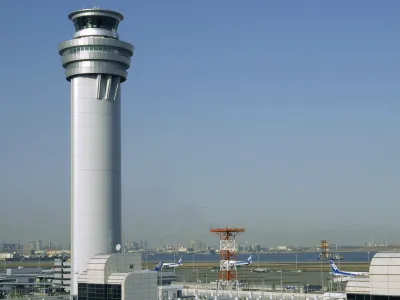 This shows an airport traffic control tower at Haneda airport in Tokyo, on Jan. 9, 2010. The 379 passengers of Japan Airlines Flight JAL-516 didn't expect their plane to burst into flames just as it was about to touchdown at Tokyo's Haneda airport Tuesday evening, on Jan. 2, 2024. A smaller coast guard Bombardier Dash-8 aircraft, preparing to take off to deliver urgent aid to quake-hit central Japan, was using the same runway when the two collided. The Associated Press collected accounts from witnesses, officials and transcripts of the traffic controls communication. (Kyodo News via AP)