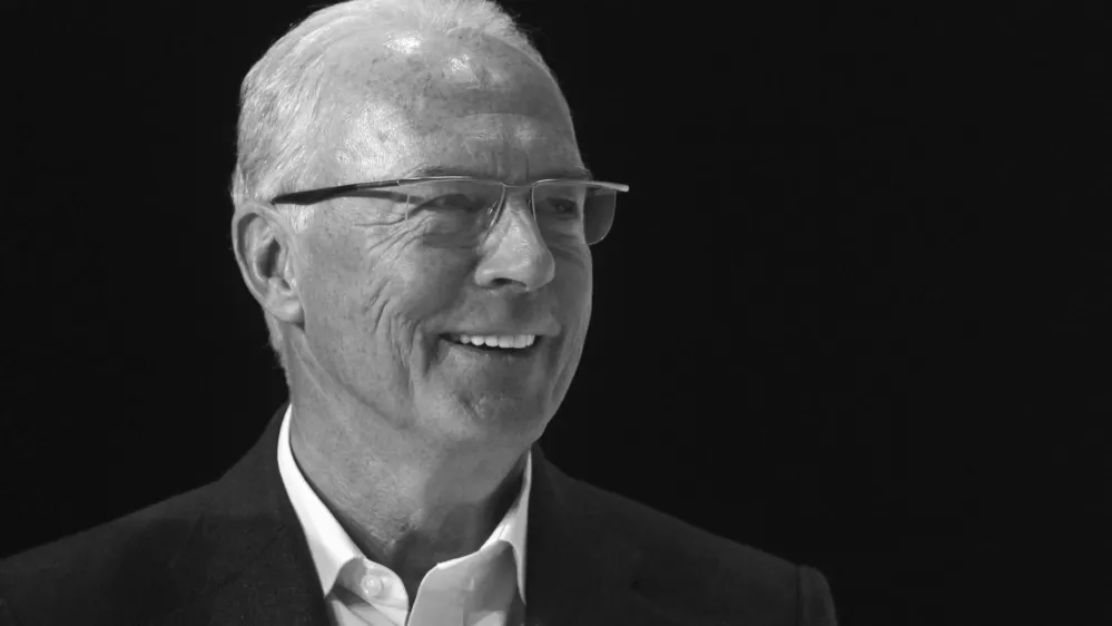 FILE - Fifa executive committee member Franz Beckenbauer smiles during the FIFA Soccer World Cup award ceremony at the adidas headquarters in Herzogenaurach near Nuremberg, southern Germany, on Tuesday, Dec. 14, 2010. (AP Photo/Matthias Schrader, File)