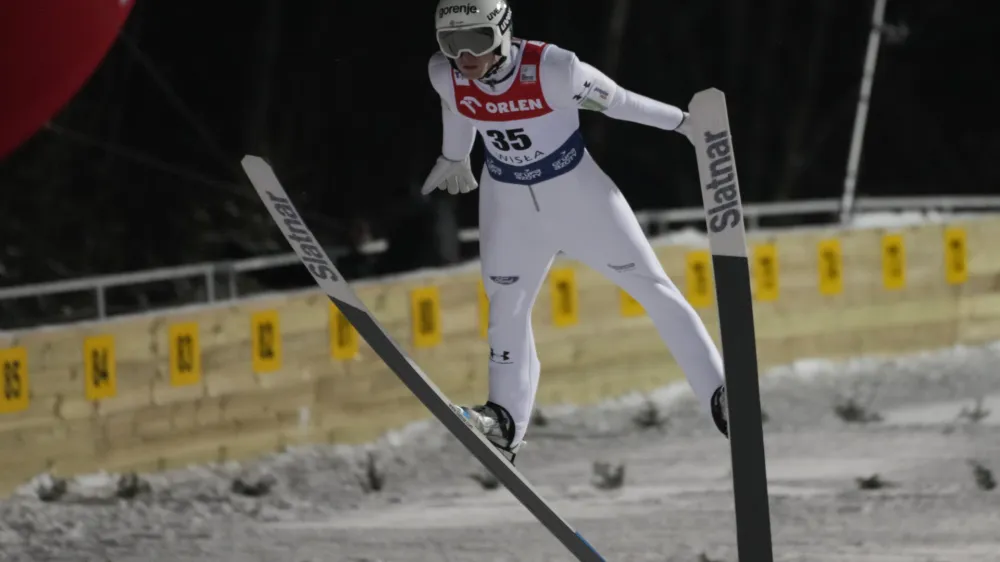 Slovenia's Lovro Kos competes at the Large Hill HS134 Ski Jumping World Cup event in Wisla, Poland, Sunday, Jan. 14, 2024. (AP Photo/Czarek Sokolowski)