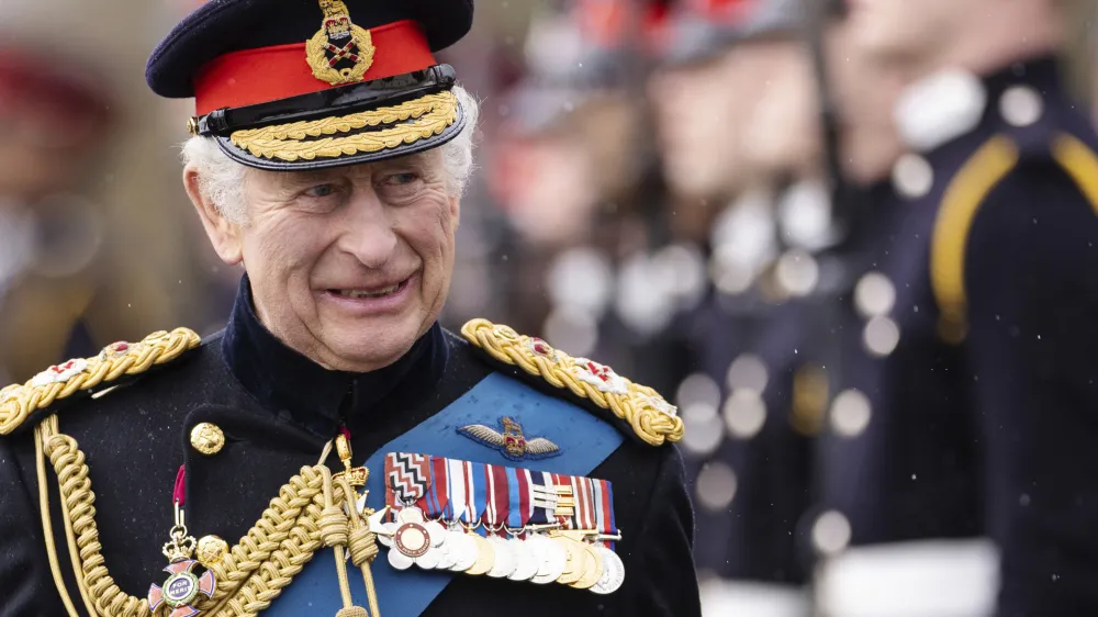 Britain's King Charles III inspects the 200th Royal Military Academy Sandhurst Sovereign's Parade and presents the new Colours and Sovereign's Banner to the receiving Ensigns in Camberley, England, Friday, April 14, 2023. (Dan Kitwood/Pool Photo via AP)