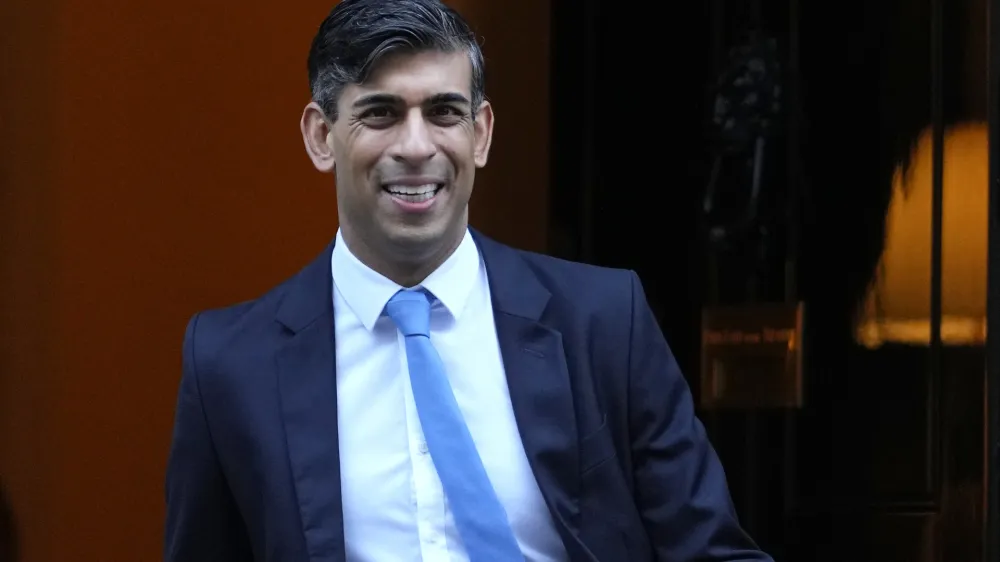 Britain's Prime Minister Rishi Sunak leaves 10 Downing Street to attend the weekly session of Prime Ministers Questions in parliament, in London, Wednesday, Jan. 10, 2024. (AP Photo/Kirsty Wigglesworth)