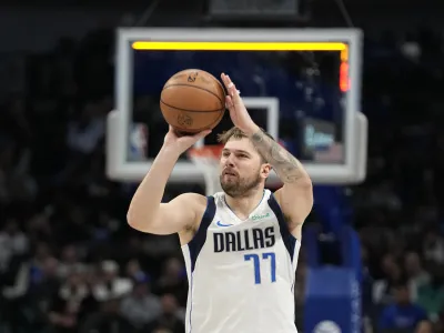 Dallas Mavericks guard Luka Doncic shoots during the second half of an NBA basketball game against the Memphis Grizzlies in Dallas, Tuesday, Jan. 9, 2024. (AP Photo/LM Otero)