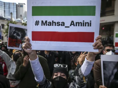 Iranian women gather to protest over the death of Mahsa Amini during a demonstration outside the Iranian consulate in Istanbul, Turkey, Monday, Oct. 17, 2022. Amini, a 22-year-old woman who had been detained by Iran's morality police in the capital of Tehran for allegedly not adhering to Iran's strict Islamic dress code, died while being in police custody. (AP Photo/Emrah Gurel)