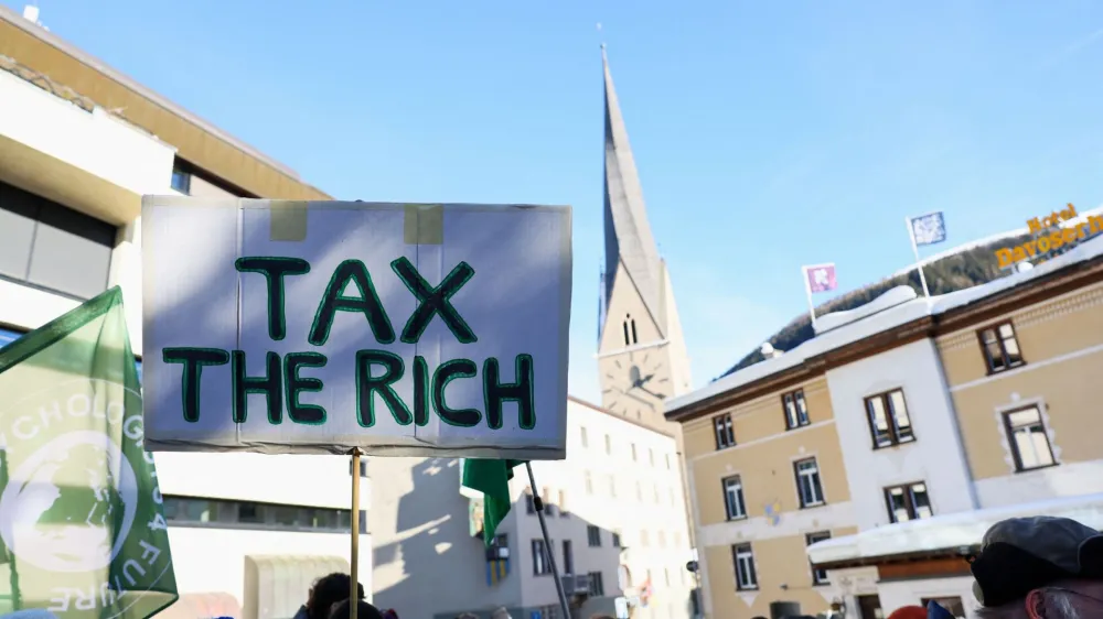 Climate activists and anti-WEF (World Economic Forum) demonstrators take part in a protest ahead of the opening of the WEF annual meeting in Davos, Switzerland, January 14, 2024. REUTERS/Denis Balibouse