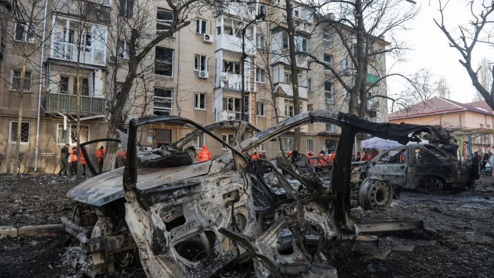 A view shows destroyed cars and an apartment building damaged during a Russian drone strike, amid Russia's attack on Ukraine, in Odesa, Ukraine January 17, 2024. REUTERS/Stringer