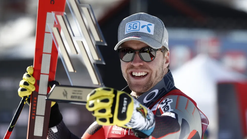 Norway's Aleksander Aamodt Kilde celebrates winning an alpine ski, men's World Cup super-G, in Kvitfjell, Norway, Sunday March 6, 2022. (AP Photo/Gabriele Facciotti)