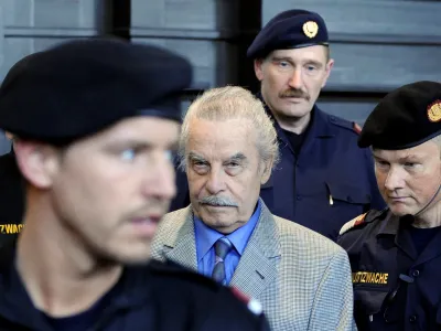 FILE PHOTO: Defendant Josef Fritzl is pictured during proceedings on the last day the last day of his trial at the court of law in Sankt Poelten in Austria's province of Lower Austria March 19, 2009. An Austrian court on Thursday sentenced Josef Fritzl to life behind bars for rape, enslavement and murder for locking up and raping his daughter in a cellar over 24 years and causing his son's death. The 73-year-old Austrian had said he was sorry from the "bottom of my heart" over the case, in which he fathered seven children with daughter Elisabeth.  REUTERS/POOL/Robert Jaeger  (AUSTRIA CONFLICT SOCIETY) FOR EDITORIAL USE ONLY. NOT FOR SALE FOR MARKETING OR ADVERTISING CAMPAIGNS/File Photo