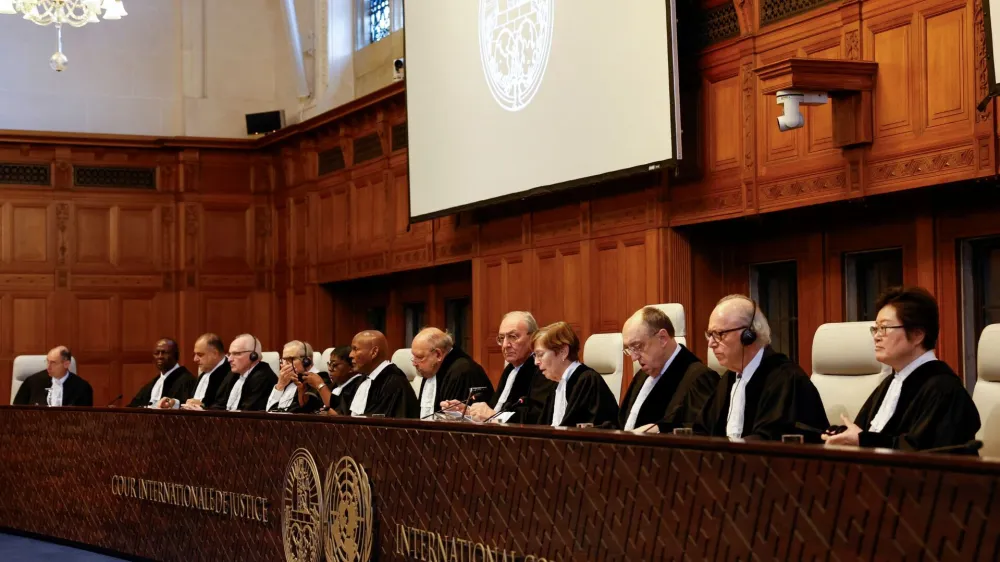 Judges at the International Court of Justice (ICJ) rule on emergency measures against Israel following accusations by South Africa that the Israeli military operation in Gaza is a state-led genocide, in The Hague, Netherlands, January 26, 2024. REUTERS/Piroschka van de Wouw