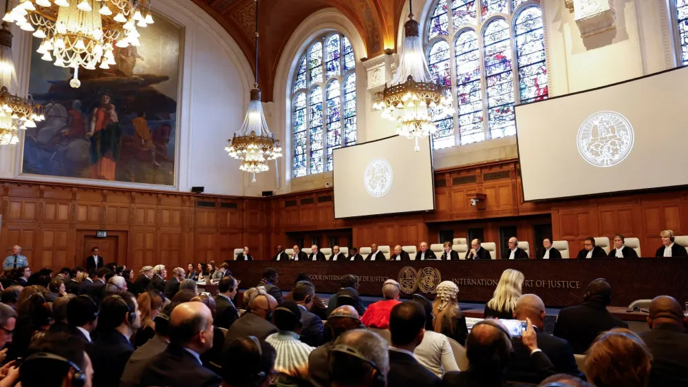Judges at the International Court of Justice (ICJ) rule on emergency measures against Israel following accusations by South Africa that the Israeli military operation in Gaza is a state-led genocide, in The Hague, Netherlands, January 26, 2024. REUTERS/Piroschka van de Wouw