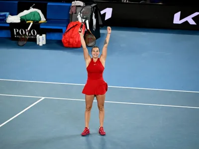 Tennis - Australian Open - Melbourne Park, Melbourne, Australia - January 27, 2024 Belarus' Aryna Sabalenka celebrates winning the final against China's Qinwen Zheng REUTERS/Tracey Nearmy