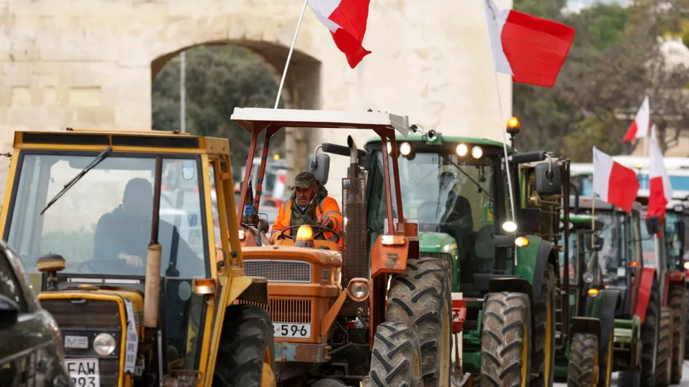 Farmers drive tractors during a protest against European agricultural policies, in Floriana, Malta February 2, 2024. REUTERS/Darrin Zammit Lupi