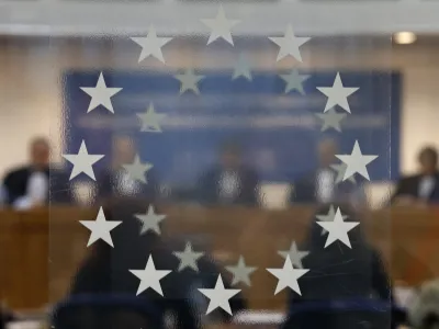 Judges of the European Court of Human Rights are seen during an hearing at the court in Strasbourg, December 3, 2013. The hearing concerns the case of two men, suspected of terrorist acts, detained in December 2002 at a CIA secret detention site in Poland at which they say illegal interrogation methods were used. Both men are currently detained at the Guantanamo Bay U.S. Naval Base in Cuba. REUTERS/Vincent Kessler (FRANCE - Tags: CRIME LAW POLITICS) - RTX161ZJ