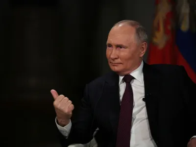Russian President Vladimir Putin speaks during an interview with U.S. television host Tucker Carlson in Moscow, Russia February 6, 2024. Sputnik/Gavriil Grigorov/Kremlin via REUTERS ATTENTION EDITORS - THIS IMAGE WAS PROVIDED BY A THIRD PARTY.