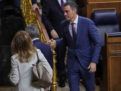 Spain's Socialist Prime Minister Pedro leaves the Spanish Parliament in Madrid, Spain, Thursday, March 14, 2024. Spain's Parliament on Thursday has approved a controversial amnesty bill aimed at forgiving crimes &mdash; both proved and alleged &mdash; committed by Catalan separatists during a chaotic attempt to hold an independence referendum six years ago. (AP Photo/Manu Fernandez)