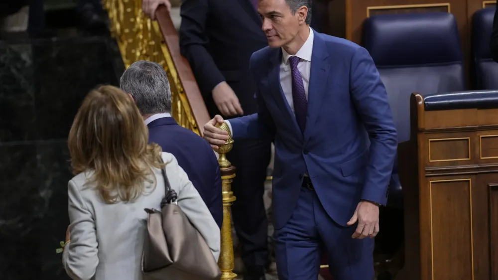 Spain's Socialist Prime Minister Pedro leaves the Spanish Parliament in Madrid, Spain, Thursday, March 14, 2024. Spain's Parliament on Thursday has approved a controversial amnesty bill aimed at forgiving crimes &mdash; both proved and alleged &mdash; committed by Catalan separatists during a chaotic attempt to hold an independence referendum six years ago. (AP Photo/Manu Fernandez)
