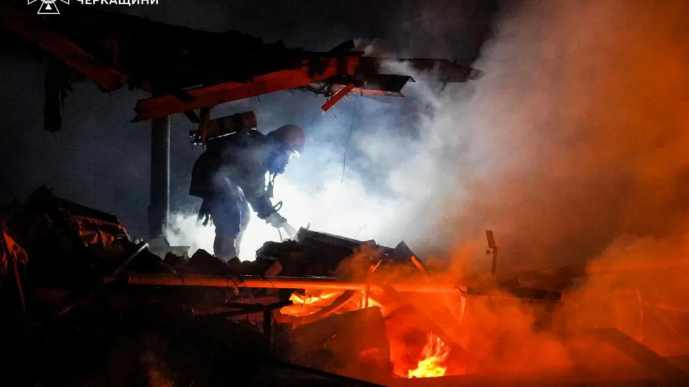 A firefighter works at a site of a Russian missile and drone strike, amid Russia's attack on Ukraine, in Cherkasy region, Ukraine March 29, 2024. Press service of the State Emergency Service of Ukraine in Cherkasy region/Handout via REUTERS ATTENTION EDITORS - THIS IMAGE HAS BEEN SUPPLIED BY A THIRD PARTY. DO NOT OBSCURE LOGO.