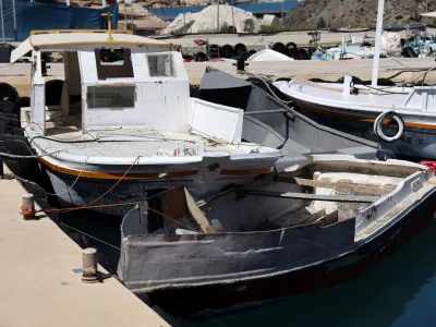 Boats used by migrants are moored at a fishing shelter in Paralimni, Cyprus, April 5, 2024. This week the island has seen un unprecedented influx of hundreds of refugees from Syria, whom Cypriot authorities said set off from the coast of Lebanon. REUTERS/Yiannis Kourtoglou