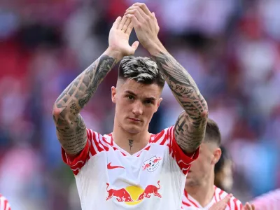 Soccer Football - Bundesliga - RB Leipzig v VfL Wolfsburg - Red Bull Arena, Leipzig, Germany - April 13, 2024 RB Leipzig's Benjamin Sesko celebrates after the match REUTERS/Annegret Hilse DFL REGULATIONS PROHIBIT ANY USE OF PHOTOGRAPHS AS IMAGE SEQUENCES AND/OR QUASI-VIDEO.