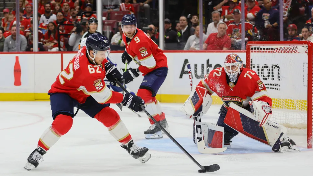 Apr 21, 2024; Sunrise, Florida, USA; Florida Panthers defenseman Brandon Montour (62) moves the puck against the Tampa Bay Lightning during the second period in game one of the first round of the 2024 Stanley Cup Playoffs at Amerant Bank Arena. Mandatory Credit: Sam Navarro-USA TODAY Sports