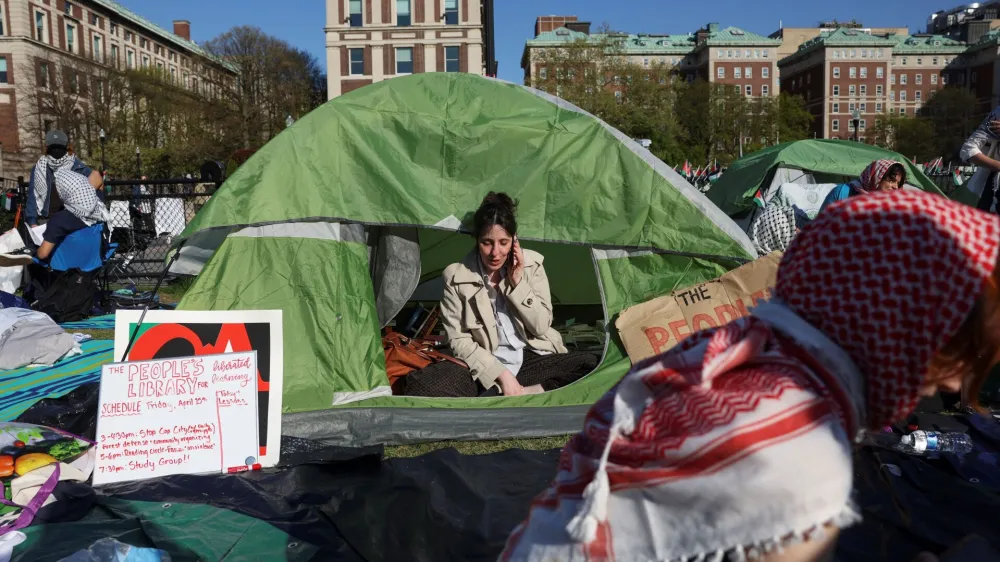 A tent set up as a library is seen as students continue to maintain a protest encampment in support of Palestinians at Columbia University, during the ongoing conflict between Israel and the Palestinian Islamist group Hamas, in New York City, U.S., April 26, 2024. REUTERS/Caitlin Ochs