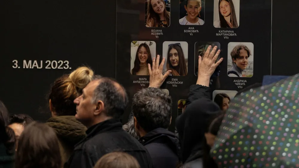 People gather to pay tribute to the victims of the mass shooting at Vladislav Ribnikar elementary school during the first anniversary commemoration in Belgrade, Serbia, May 3, 2024. REUTERS/Marko Djurica