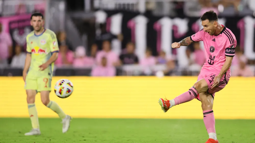 May 4, 2024; Fort Lauderdale, Florida, USA; Inter Miami CF forward Lionel Messi (10) passes during the second half against the New York Red Bulls at Chase Stadium. Mandatory Credit: Sam Navarro-USA TODAY Sports