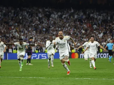 Soccer Football - Champions League - Semi Final - Second Leg - Real Madrid v Bayern Munich - Santiago Bernabeu, Madrid, Spain - May 8, 2024 Real Madrid's Joselu celebrates scoring their second goal REUTERS/Susana Vera