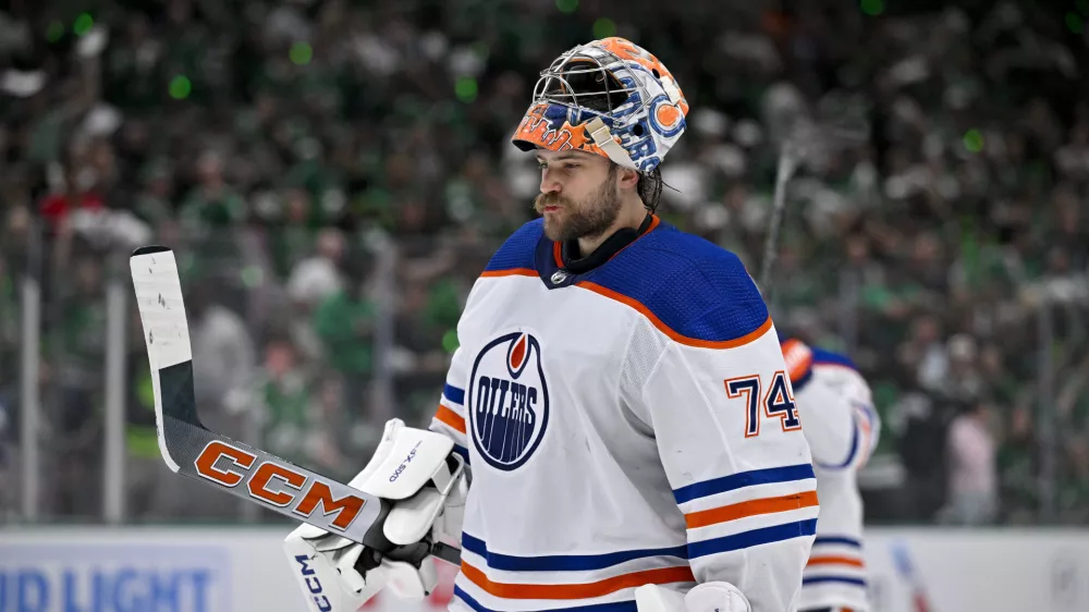 May 23, 2024; Dallas, Texas, USA; Edmonton Oilers goaltender Stuart Skinner (74) skates back on the ice during the overtime period against the Dallas Stars n game one of the Western Conference Final of the 2024 Stanley Cup Playoffs at American Airlines Center. Mandatory Credit: Jerome Miron-USA TODAY Sports